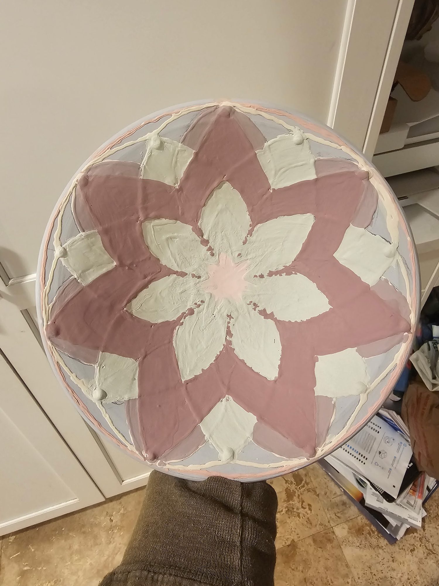 Unfired platter with thick petal glaze in rose and celadon